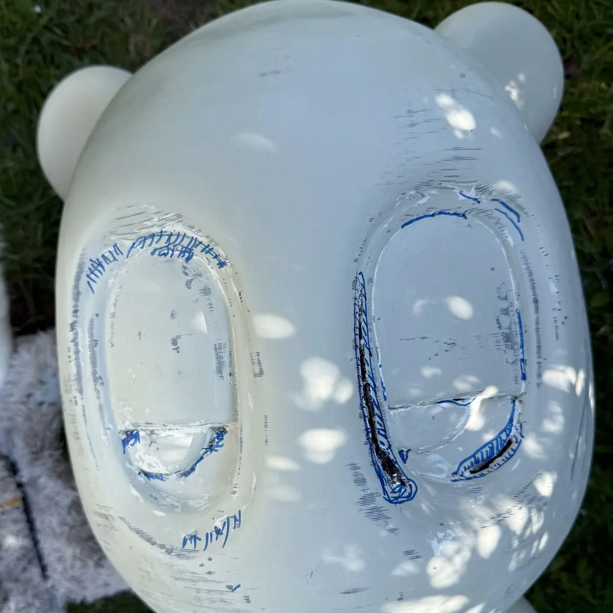 Sanding the hot glue